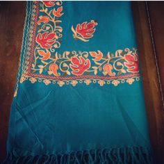 All Over Hand Embroidered Floral Kashmir Wool Wrap Evening Piano Shawl/Dupatta Scarf/India Floral Wool Woolen Scarf ***** Exclusive - Only 1 In Stock ****** Shawl - Indian Shawl - Kashmir Shawl - Handwoven Scarf - Woolen Shawl- Embroidered Shawl - Wraps Shawls This Shawl Is Embellished With Beautiful Floral Embroidery Capturing The Attention Of One And All. Hand-Woven By Locals In Kashmir. The Base Of The Shawl Is Made Of Turquoise Colored Wool Threads. You’ll Notice The Difference From The Mome Traditional Turquoise Embroidered Dupatta, Traditional Turquoise Dupatta With Intricate Embroidery, Blue Bohemian Shawl For Festivals, Bohemian Blue Dupatta With Floral Embroidery, Bohemian Blue Dupatta With Intricate Embroidery, Traditional Blue Shawl With Motifs, Traditional Blue Shawl With Embroidered Border, Blue Shawl With Zari Work In Traditional Drape, Traditional Blue Shawl For Festivals