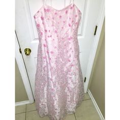 Beautiful Gown With Pink Florals All Over Dress. Spaghetti Straps And In The Back You Can Adjust By The Lace.Super Elegant To Wear To A Wedding, Or Party.Size Xlarge ,But Fits A Large Or Medium. I’m 5’3 And It Covers My Feet . Spring A-line Gown With Lined Bodice, Spring Evening Dress With Spaghetti Straps And Lined Bodice, Spring Formal Gown With Sweetheart Neckline, Fitted Ball Gown For Spring, Fitted Ball Gown For Summer, Spring Garden Party Ball Gown, Pink Summer Gown With Sweetheart Neckline, Feminine Spring Ball Gown Dresses, White Ball Gown Evening Dress For Spring