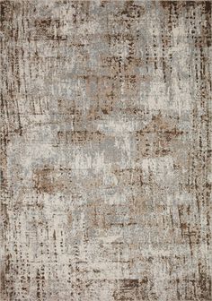 an area rug with brown and white colors