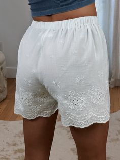 Absolutely adorable Vintage-esque High Waisted White Eyelet Shorts ft. double lining & stretchy elastic waist. These do not have pockets. Not necessarily see through but lighter/nude Undies are recommended! Maclaine is 5'7 and wearing a size Small. She typically wears a 26 in jeans and the small fit great! Waist does have stretchy elastic! 100% Cotton (lining 100% Viscose Rayon) Vacation Bottoms With Elastic Waistband And Short Leg, Non-stretch Beach Shorts With Elastic Waistband, Bottoms With Elastic Waistband For Day Out, Beach Shorts With Elastic Waistband And Non-stretch, Non-stretch Beach Shorts, Chic Elastic Summer Bottoms, Chic Elastic Bottoms For Summer, Non-stretch Short Bottoms For Day Out, Summer Pull-on Style Bottoms For Day Out