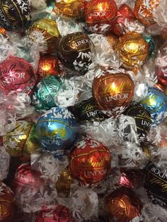 assorted chocolate candies wrapped in plastic wrap