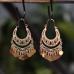 Adding A Touch Of Boho, These Earrings Will Sure Dress Up Your Daily Outfits! Featuring Cut-Out Detail And Tassel Pendants For Some Fun. Material: Base Metal. Measurements: Approx. 3" Length Drop, 1.5" Width. Care Instructions: Limit Exposure To Water, Perfume Or Body Cream To Extend The Life Of Your Jewelry Bohemian Gold Danglers For Parties, Gold Bohemian Party Danglers, Elegant Dangle Chandelier Earrings For Festivals, Elegant Dangle Hoop Earrings For Festivals, Gold Teardrop Chandelier Earrings For Festivals, Festive Nickel-free Metal Chandelier Earrings, Gold Chandelier Drop Earrings For Festival, Bohemian Gold Teardrop Earrings For Party, Bohemian Hoop Earrings For Party