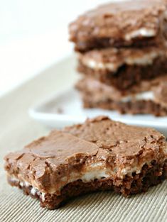 three pieces of chocolate dessert on a plate