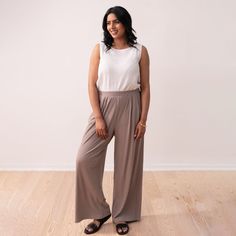 Discover our sustainable Comfy Wide Leg Pant. Feel comfortable while looking chic. Perfect for work or a night out. Free shipping on orders over $200. Versatile Relaxed Fit Dress Pants With Elastic Waistband, Versatile Ankle-length Wide Leg Pants, Effortless Wide Leg Workwear Pants, Effortless Wide Leg Straight Pants For Work, Versatile Straight Dress Pants With Elastic Waistband, Versatile Wide Leg Pants For Business Casual, Versatile Wide Leg Business Casual Pants, Versatile Business Casual Wide Leg Pants, Versatile Dress Pants With Elastic Waistband For Business Casual