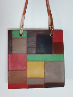 Genuine cow hide classic tote bag. multi colored patchwork bag.Dimentions 30x35x12 cm Multicolor Patchwork Tote Satchel, Multicolor Patchwork Satchel Shoulder Bag, Multicolor Patchwork Satchel For Daily Use, Multicolor Patchwork Satchel Bag, Daily Use Multicolor Patchwork Satchel, Multicolor Patchwork Satchel For Everyday Use, Green Patchwork Tote Shoulder Bag, Multicolor Patchwork Tote Bag, Red Patchwork Tote Bag