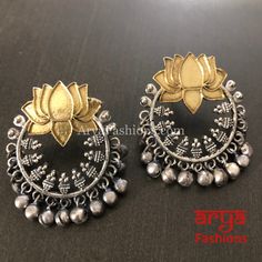 Lotus Flower Dual Tone Golden Oxidized Chandbali Earrings Traditional Festive Jewelry With Flower Shape, Traditional Flower Earrings For Festive Occasions, Traditional Flower Drop Earrings For Celebration, Silver Flower Earrings For Celebration, Traditional Silver Flower Earrings For Festive Occasions, Traditional Silver Drop Flower Earrings, Traditional Silver Flower Earrings, Traditional Flower Jewelry For Diwali, Traditional Flower-shaped Jewelry With Matching Earrings