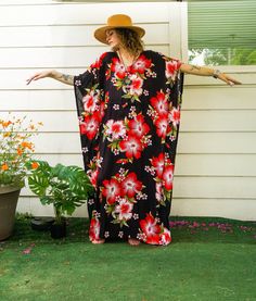 Embrace the essence of summer with our Hibiscus Floral Boho Kaftan Dress. This handmade kaftan, ideal for beachwear, loungewear, and as a swimsuit cover-up, captures the tropical Hawaiian vibe. Crafted from premium rayon, it promises comfort and style in equal measure.  Features ‣ Boho/Hippie/Hawaiian/Beach/Tropical Theme: Perfect for a relaxed, stylish look suitable for various occasions. ‣ Loose Fit: Designed to provide maximum comfort with a relaxed fit. ‣ Adjustable Rope: Features an adjustable rope around the waist to customize the fit. ‣ One Size Fits Most: Suitable for US Women's sizes M-3XL, offering versatility and comfort. ‣ Premium Rayon Fabric: Breathable and comfy for all-day wear. Generous Measurements: ‣ Bust: Fits 60"-90" ‣ Length of Dress: 55" ‣ Width of Dress: 45" ‣ Ident Red Tropical Print Dress For Beach, Red Tropical Print Dress For The Beach, Red Tropical Maxi Dress For Beach Season, Tropical Red Beach Dress, Beachwear Floral Print Maxi Dress In Free Size, Free Size Floral Print Maxi Dress For Beachwear, Long Floral Print Beach Dress For Beach Season, Bohemian Red Sarong For Vacation, Red Bohemian Sarong For Vacation