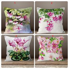 four pillows with different flowers on them, one is pink and the other is green