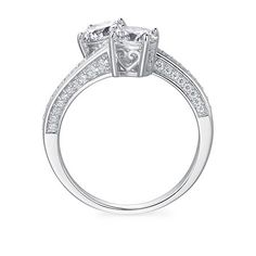 Ring Style: Cocktail RingsSetting: ProngShape: RoundStone: Cubic ZirconiaStone Cut: RoundRing Size: 7Metal Color: WhiteRing Gallery Height: 6.2mmRing Top Length: 12.5mmRing Top Width: 21.3mmRounded Carat Weight: 2 1/4 Ct. T.w.Metal: Sterling SilverBand Width: Care: Polishing ClothStone Type: 58 Cubic ZirconiaCountry of Origin: Imported Cubic Zirconia Open Ring For Anniversary, Anniversary Couple Rings With Vs Clarity Cubic Zirconia, Brilliant Cut Cubic Zirconia Couple Promise Rings, Cubic Zirconia Cluster Ring For Anniversary, Silver Couple Rings With Cubic Zirconia And Prong Setting, Classic Cubic Zirconia Bypass Promise Ring, Classic Heart Ring With Vs Clarity Cubic Zirconia, Classic Cubic Zirconia Couple Rings For Promise, Anniversary Couple Rings With Cubic Zirconia