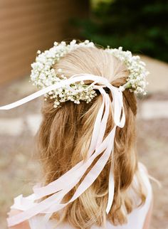 an instagram page with a baby's breath flower girl on the bottom right corner