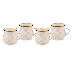 three pink and white checkered pitchers with gold rims