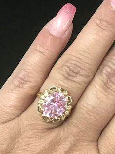 GORGEOUS VINTAGE 14K YELLOW GOLD LARGE PINK STONE RING Very pretty ring crafted of solid 14K Yellow Gold! Band a little bent but does not affect wear. Large pink stone solitaire, 13mm x 11mm Weighs 5.4 grams total. Size 6.25 Shipped with insurance. Pink Gold Fine Jewelry Round Ring, Pink Gold Gemstone Rings, Hallmarked 14k Pink Gold Jewelry, 14k Pink Gold Jewelry For Anniversary, Pink Round Heirloom Jewelry, Vintage 14k Gold Pink Jewelry, 14k Pink Gold Jewelry With Round Cut, 14k Gold Pink Solitaire Jewelry, 14k Pink Gold Jewelry With Prong Setting