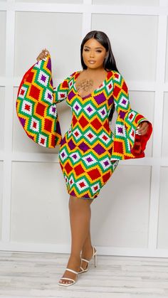 Boss Up in this Efia Kente African Print Midi Dress with majestic sleeves This gorgeous mini dress is ideal for any occasion! Modest but captivating. It can be worn in the office or dressed up for after-work drinks. Perfect For The Efia Kente African Print Midi Dress is perfect for all sorts of functions. Girls night out Casual hangouts Date night Birthday dinner High-end formal events Features V-neckline Non-stretch True to size Mini length Flare sleeve Back zip fastening Extremely flattering f Fitted Long Sleeve Dress With Bell Sleeves For Party, Multicolor V-neck Formal Dresses, Fitted Multicolor Midi Dress, Fitted Multicolor Midi Mini Dress, Fitted Multicolor V-neck Dress For Party, Multicolor Fitted V-neck Mini Dress, Fitted Multicolor V-neck Mini Dress, Elegant Multicolor Midi Length Bodycon Dress, Elegant Multicolor Long Sleeve Bodycon Dress