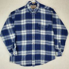 London Fog Men's  Long Sleeve Flannel Shirt  Size L Item is pre-owned and shows normal wear. Shirt is plaid, dark blue, light blue and white. Please take measurements into consideration for clothing fit.      Approximate flat lay measurements:                    Pit to pit:  24"                  Shoulder:  18"           Sleeve length:  28"                      Length:  30" Please view photos of the item. I am available for questions. Classic Blue Long Sleeve Flannel Shirt, Classic Blue Collared Flannel Shirt, Classic Blue Flannel Shirt With Button Closure, Classic Blue Flannel Shirt For Fall, Classic Blue Flannel Shirt With Buttons, Blue Long Sleeve Flannel Shirt With Button Closure, Blue Long Sleeve Flannel Shirt With Buttons, Blue Cotton Flannel Shirt With Button Closure, Blue Button-up Flannel Shirt With Snap Buttons