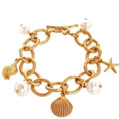 Women's Dangle Sea Shell Charm Bracelet Description: Imported Fashion Sea Creature Dangle Bracelet Elegant Metal Jewelry For Beach, Elegant Beach Chain Bracelet, Gold Bracelet With Pearl Charm For Beach, Elegant Metal Bracelets For Beach, Beach Charm Bracelet With Lobster Clasp, Gold Metal Charm Bracelet For Beach, Gold Bohemian Pearl Bracelet, Bohemian Metal Pearl Bracelet, Gold Chain Bracelets For Beach