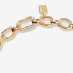 Here's a playful extra! Lollo is a fun gold clasp that appears as a single crystal embellished chain link. Combine 1 or more to extend your chain as needed. Its secure hinge mechanism allows for easy use whilst giving a polished and sophisticated appearance. Perfect for lengthening necklaces, anklets and bracelets. It can also be worn as a minimal charm. Luxury Link Jewelry With Gold Clasp, Luxury Gold-plated Jewelry With Adjustable Chain, Luxury Yellow Gold Chain Bracelet With Toggle Clasp, Luxury Gold-tone Necklace With Gold Clasp, Luxury Gold-plated Chain Bracelet With Lobster Clasp, Pearl Earring Set, Pearl Statement Earrings, Solid Gold Rings, Star Studs