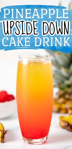 a pineapple upside down cake drink in a glass next to some pineapples