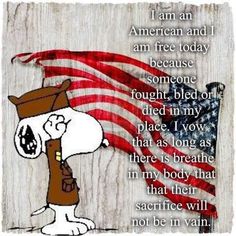 an american flag and a cartoon dog with the words, i am free today because someone fought in my place