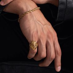 An ancient symbol of power and strength, the Lion Ring bestows courage and bravery to the wearer. The king of all cats, the Lion is the guardian of family, pride, and confidence. MATERIAL No Green Skin Guarantee® Solid Lion Ring Plated with Genuine 18 Karat Yellow Gold Surgical & Military Grade 316L Stainless Steel Wraps Finger with Opening at the top Marcozo "M" Logo Stamped on the back SIZE Ring Size: 8.5x8.5x2.2mm Sizes: 7-13 Visit our Size Chart link for more information Men Gold Accessories, Lion Rings For Men Gold, Mens Jewelry Rings Gold, Golden Rings For Men, Men Gold Rings, Mens Jewelry Rings, Men Gold Ring, Jewelry Rings Gold, Gold Finger Rings