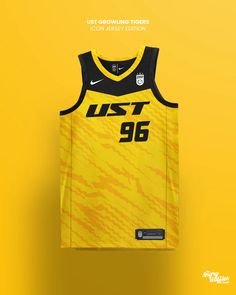 the nike basketball jersey is yellow and black with white lettering that reads, just growing tigers