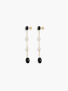 The dualism long earrings by ragbag offer a luxurious and refined accessory for any occasion. made with creamy freshwater pearls elegant black onyx and 925 sterling silver trimmings these earrings are sure to catch the eye and elevate your appearance.    details    - drop earrings with black onyx  - freshwater pearls  - nickel-free    fabric   care    composition: 925 sterling silver Long Gold Earrings, Summer Accessories, Gift Store, Free Fabric, Long Earrings, The Eye, Corporate Gifts, Black Onyx, Fabric Care