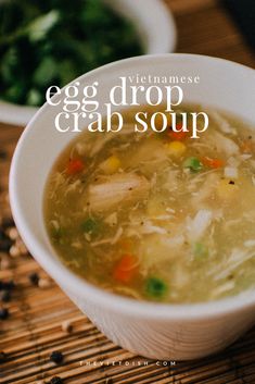 an egg drop crab soup in a white bowl on a bamboo mat with the title overlay