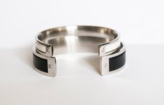 "Beautiful wedding gift for Couples. Set of two Matching Cuff Bracelets. Amazing, unique Stainless Steel cuffs with Genuine Leather Inlay. Made with Genuine high quality European leather and high quality Stainless Steel. Perfect, meaningful, special couples anniversary gift, valentines gift, wedding gift, birthday gift. ✧ 100% Handcrafted ✧ Absolutely Unique ✧ Hypoallergenic ✧ High Grade Surgical Stainless Steel (will not rust or tarnish) ✧ High Quality Genuine Leather Inlay ✧ Gift-ready in a cu Engraved Cuff Bangle For Wedding, Wedding Engraved Cuff Bangle, Engraved Cuff Bracelet For Wedding, Black Cuff Jewelry For Anniversary, Stainless Steel Cuff Bracelet Bangle For Wedding, Stainless Steel Bangle Cuff Bracelet For Weddings, Stainless Steel Cuff Bangle For Wedding, Modern Initials Wedding Jewelry, Modern Initials Jewelry For Wedding