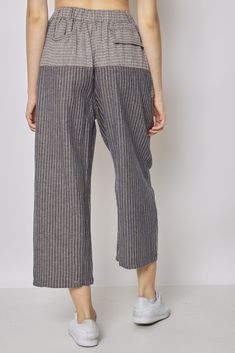 Description


Bring a touch of casual sophistication to your wardrobe with our striped gray linen pants. Its fluid and light cut offers you optimal comfort while remaining stylish. Imagine yourself walking through the streets of Paris, dressed in these trendy pants, ready to face the freshness of autumn. Wear it with a wool sweater and ankle boots for a casual outfit while walking around town. For a special night out, pair it with a sleek blouse and heels for a sophisticated look. Our gray strip Striped Linen Pants, Parisian Look, Autumn Wear, Trendy Pants, Streets Of Paris, Paris Street, Gray Linen, Outfit Casual, Striped Linen