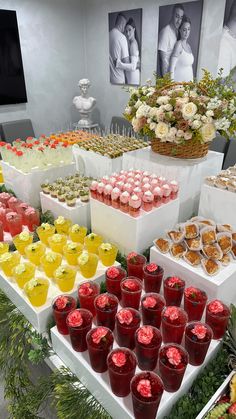 a table filled with lots of different types of desserts