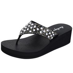 PRICES MAY VARY. 100% Synthetic . EVA Yoga Foam Flexible Sole. 1.9-inch heel and 0.7-inch front platform give these rhinestone embellished sandals the comfort of a flip-flop and the beauty of a fashion shoe. The Ladies Flip-Flops Sandals are marshmallow soft yet highly durable. You can enjoy walking with sufficient support without pain. Rhinestone embellished: The flip flops feature an exquisite rhinestone design on the strap, adding a touch of glamour and sophistication to your outfit. Whether Synthetic Wedge Sandals With Rhinestones For Vacation, Synthetic Rhinestone Wedge Sandals For Vacation, Vacation Synthetic Wedge Sandals With Rhinestones, Embellished Synthetic Toe Post Sandals, Synthetic Rhinestone Wedge Sandals For Beach, Synthetic Open Toe Wedge Sandals With Rhinestones, Open Toe Synthetic Wedge Sandals With Rhinestones, Synthetic Toe Post Sandals With Rhinestones, Black Wedge Sandals With Rhinestones For Summer