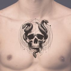 a man with a skull and snake tattoo on his chest