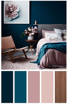 a bedroom with blue walls and pink accents