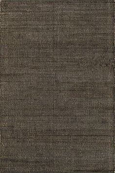 an area rug with dark brown colors