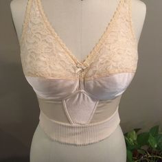 Nwot “Almost U “ Beige Longline Bra With Pocket Opening For For Inserts. New. Never Worn. Back Has Hook And Eye Opening. Straps Are Adjustable. Elastic Band At Waist For Contour Fit. Size 38c ( Shown On Smaller Size 8 Mannequin). Very Soft And Flexible...Ll Note: Two Of These Bras Are Available...Priced Separately...Ll Fitted Cream Camisole With Built-in Bra, Lace Fitted Bra-friendly Camisole, Fitted Lace Camisole With Bra-friendly Design, Fitted Lace Camisole Bra Friendly, Beige Fitted V-neck Camisole, Beige Fitted Camisole, Fitted Bra-friendly Tops For Daywear, Fitted Underbust Bra Partially Lined, Feminine Fitted Camisole For Daywear