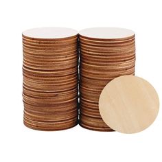 a stack of brown and white coasters next to each other