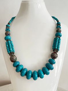 This necklace is a perfect gift for someone who truly loves and appreciates beautiful gemstones. I can only say that it is a beautiful piece of jewelry that will really make you stand out from the crowd. This necklace is made of huge turquoise beads. * Antique Moroccan Berber Necklace Handmade with turquoise beads, the necklace features an intricate pattern in its texture, a beautiful Berber piece of jewelry that radiates Moroccan Berber history and cultural significance, each handcrafted by art Traditional Turquoise Necklace As Gift, Traditional Turquoise Necklace For Gift, Bohemian Necklaces With Stones For Meditation, Turquoise Crystal Necklaces With Natural Stones, Bohemian Necklace With Round Beads, Handmade Turquoise Necklace For Meditation, Handmade Long Turquoise Necklace For Gift, Bohemian Turquoise Necklace With Natural Stones, Traditional Handmade Turquoise Beaded Necklaces