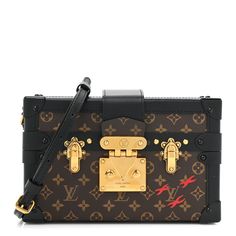 This is an authentic LOUIS VUITTON Monogram Petite Malle in Black. This trunk-style bag is crafted of Louis Vuitton monogram on coated canvas. The bag features black leather trim, an optional, adjustable black leather shoulder strap, and crossover top flap with gold-toned press lock and buckles on either side. The corners are reinforced with black hardware end caps. The bag opens to a beige leather interior with a patch pocket. Crossover Top, Black Hardware, Leather Interior, Leather Trim, Authentic Louis Vuitton, Leather Trims, Crossover, Louis Vuitton Monogram, Patch Pocket