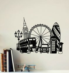 a black and white wall decal with an image of london, big ben, the wheel of fortune