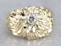 This beautiful fun ring has a stunning floral design, with lovely sculptural details that make it look super life-like! The polished yellow gold also has some beautiful details in the scattered petals, and the center of the flower sits a bright, sparkling diamond! Metal: 14K Yellow Gold Gem: Diamond .20 Carats, VVS in Clarity, G in Color Gem Measurements: 3.4 mm, Round Ring Size: 6.25 Marks: "14K" Stamped on the inside band Yellow Gold Sapphire Ring, Vintage Drop Earrings, Right Hand Ring, Statement Rings Diamond, Monogram Pendant, Diamond Solitaire Ring, Monogram Ring, Right Hand Rings, Hand Ring