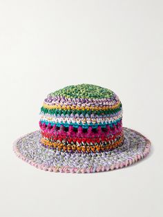 a multicolored crocheted hat on a white background