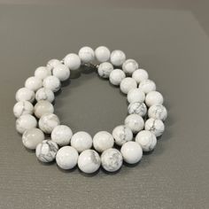 Product Description: Item Code: SGH-978 Stone Name: Natural Howlite Size: 10MM Shape: Smooth Round  Color: White Length: 16 Inches (Approx.) Weight: 290Cts (Approx.) Lock: 925 Lobster Clasp 10 mm Large White Howlite Necklace, Beaded Necklace, Men's Women's Necklace, Gemstone Necklace **All natural gemstones vary in color and pattern. We try our best to make our photos represent the real products in person. ** **All Customization Facility Is Available as per your Requirement Also in Other stones. ** **Bulk Order also available** **Please feel free to contact for any further queries** Howlite Necklace, Women's Necklace, White Howlite, Necklace Beaded, Necklace Gemstone, Cool Necklaces, Necklace Gift, Large White, Men Necklace