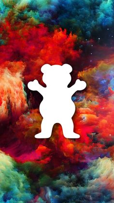 the silhouette of a teddy bear is surrounded by colorful clouds