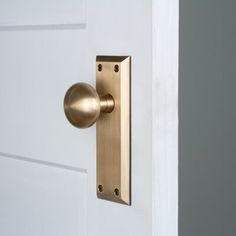 an open door with a metal handle on it