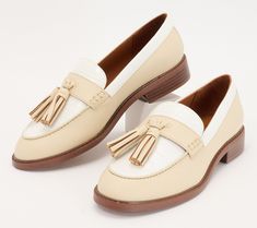 The loafer is a classic shoe that will never go out of style. Slip your feet into them and show off the chic tassel detail.  The best part about these beauties? They pair well with nearly any outfit. Wear them with a sweater and jeans, a button-front blouse and mini skirt, or a flowy printed dress. This preppy look will last throughout the seasons. From Franco Sarto. Tasseled Loafers For Workwear With Flat Heel, Workwear Loafers With Tassels And Flat Heel, Fall Office Tassel Loafers With Brogue Detailing, Trendy Tassel Loafers With Round Toe For Fall, Chic Spring Tassel Loafers For Formal Occasions, Cream Loafers For Fall Workwear, Elegant Tassel Loafers For Spring Workwear, Fall Workwear Tassel Loafers With Brogue Detailing, Chic Spring Formal Tassel Loafers