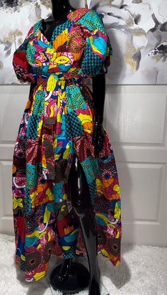 The ADESUA African Print Puff Sleeve Ball Gown is the perfect dress for your holiday celebrations. A stunning dress for any occasion really! Bold, colorful, stylish, and sassy. An Arican patchwork print dress that deserves a spot in your amazing closet. Look Unique. Know You Are Beautiful. Available in sizes S-2XL Colorful Patchwork Print Puff Sleeves Two Side Pockets Fully Lined  Cloth Belt CARE Hand Wash Or Machine Wash On Cool Gentle Cycle. Line Dry, Steam Iron. Puff Sleeve Ball Gown, Print Formal Dress, Puff Sleeve Gown, Dress Ankara, Dress African, Sleeve Gown, Cloth Belt, Patchwork Print, African Wax Print