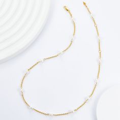 Elevate your neckline with our classic Pearl Clavicle Necklace! Versatile for both single and layered wear, this timeless piece also serves as the perfect chain for showcasing your favorite pendants. Don't miss out on the elegant beauty and endless styling possibilities of this must-have accessory! Material: 925 sterling silver plated with 18K gold, freshwater pearlsPearl: rice-shaped 4mmChain length: 38+3+3cm Elegant Pearl Chain Layered Choker Necklace, White Minimalist Necklace For Everyday Elegance, Minimalist White Necklace For Everyday Elegance, Elegant White Layered Choker Necklace, Elegant Double Strand Pearl Necklace With Clavicle Chain, Elegant Double Strand Clavicle Pearl Necklace, Elegant Double Strand Pearl Chain Layered Necklace, Delicate Single Strand Necklaces For Formal Occasions, Delicate Single Strand Necklace For Formal Occasions