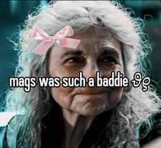 an older woman with long hair and a pink bow on her head, has the words mag