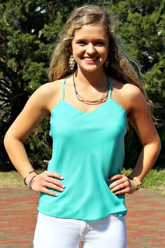 Sheila Top, Turquoise Chic Tank Top With Adjustable Straps And Strappy Back, Casual Summer Tank Top With Strappy Back, Chic Strappy Back Tank Top For Beach, Chic Tank Top With Strappy Back, Chic Strappy Back Stretch Tank Top, Adjustable Blue Halter Top, Chic Stretch Tank Top With Strappy Back, Trendy Halter Neck Tank Top With Adjustable Straps, Blue Racerback Halter Top