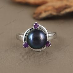 Natural Black Pearl Round Gemstone Ring, 925 Sterling Silver Amethyst Ring, Designer White Pearl Silver Ring, Handmade Pearl Ring for Her, Black Pearl & Amethyst Ring, Black Pearl & Garnet Ring, White Pearl & Citrine Ring ★ PRODUCT DETAILS ★ * SKU:- RG-1323-B-PEARL * Product:- Ring * Metal:- Sterling Silver * Metal Purity:- 925 *  Ring Weight:- 2.95 Gms (Approx.) ★ STONE DETAILS ★ *  Stone Name:- Black Pearl & White Pearl *  Stone Shape:- Round *  Stone Size:- 9mm  *  Stone Weight:- 4.14 CTS (Ap Elegant Black Amethyst Gemstone Ring, Elegant Black Amethyst Promise Ring, Black Amethyst Jewelry, Black Amethyst Jewelry For Anniversary, Black Amethyst Round Jewelry, Silver Amethyst Ring With Gemstone Accents, Sterling Silver Amethyst Ring With Gemstone Accents, Elegant Black Amethyst Ring For Anniversary, Elegant Natural Amethyst Ring