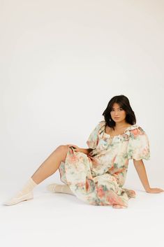 this vintage-inspired puff sleeve maxi dress is guaranteed to be your new go-to. it features a dainty ruffle neckline, dramatic puff sleeves, + a chic muted abstract floral pattern. with its relaxed silhouette + flowy shape, it’s the perfect maxi dress to pair with your favorite heels, boots, sandals, or sneaks. watercolor floral // scoop neckline, front tie, dramatic puff sleeves, pockets, contrast stitching on collar, lined model is 5'8" + wearing a small measurements are approximate + taken w Feminine Floral Print Maxi Dress With Puff Sleeves, Feminine Floral Print Puff Sleeve Maxi Dress, Feminine Puff Sleeve Midi Dress, Feminine Billowy Puff Sleeve Dress, Feminine Puff Sleeve Dress With Balloon Sleeves For Daywear, Billowy Puff Sleeve Maxi Dress For Daywear, Feminine Daywear Maxi Dress With Puff Sleeves, Feminine Maxi Dress With Puff Gathered Sleeves, Puff Sleeve Maxi Dress